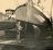 Foto van de 'Wielewaal' op de werf van Van Goor in Monnickendam direct na de aankoop in Aug.1956 met eigenaar Dr. W.F.Bon en zoon E.H. Bon